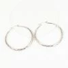 FAME Accessories Silver Engraved Hoop Earrings 1970s