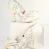 Design Asylum Manufacturing (HK) Limited (Irregular Choice Shoes) Irregular Choice Ivory Bow Lace Bridal Heels 1930s & 1940s
