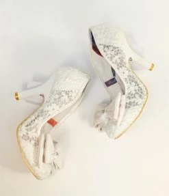 Design Asylum Manufacturing (HK) Limited (Irregular Choice Shoes) Irregular Choice Ivory Bow Lace Bridal Heels 1930s & 1940s