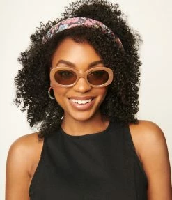 Lucent Product Inc. 1960s Brown Translucent Oval Sunglasses