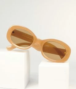 Lucent Product Inc. 1960s Brown Translucent Oval Sunglasses